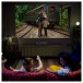 XGIMI MIRA Pro 4K UHD HDR Smart Ultra Short Throw Projector - lifestyle train