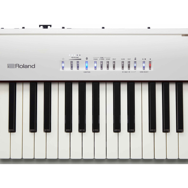 Roland FP 30 Digital Piano with Stand and Pedals, White at Gear4music