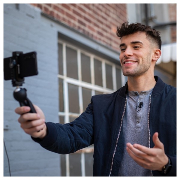 Sennheiser XS Lav Mobile Recording Kit, USB-C - Held by Vlogger