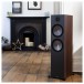Monitor Audio Bronze 500 Floorstanding Speakers (Pair), Walnut Wood stood in a living room environment