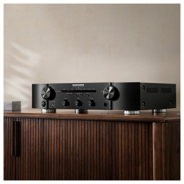 Marantz PM6007 Integrated Amplifier, Black setup on cabinet