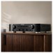 Marantz PM6007 Integrated Amplifier, Black setup on cabinet