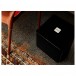 REL T5X Subwoofer, Gloss Black - lifestyle