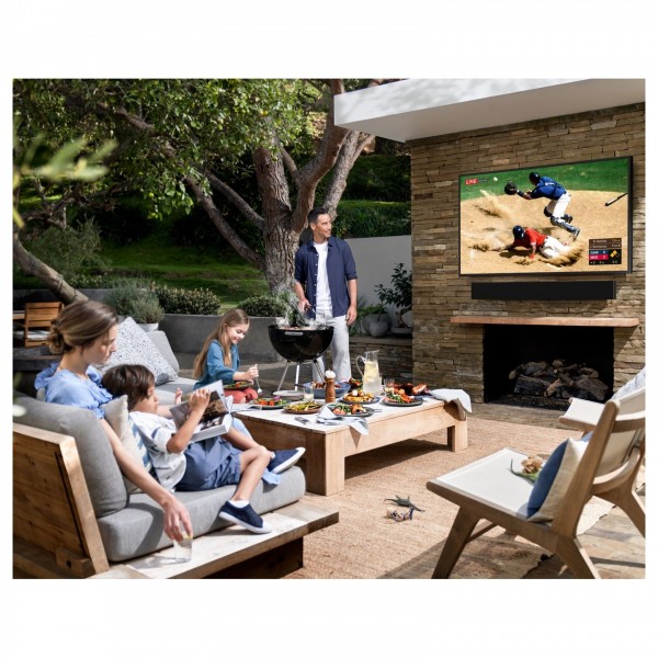 Samsung 65" Terrace QLED 4K HDR Outdoor TV and Free Terrace Soundbar, barbeque lifestyle picture