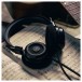 Grado SR60x Prestige Series Stereo Headphones with Headphone Stand Lifestyle View 
