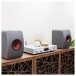 Audiolab 6000A Play Streaming Amp with KEF LS50 Meta Speakers, Lifestyle photo left side (headphones not included with bundle)