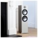 Monitor Audio Bronze 500 Floorstanding Speakers (Pair), Urban Grey Standing Next to Fireplace